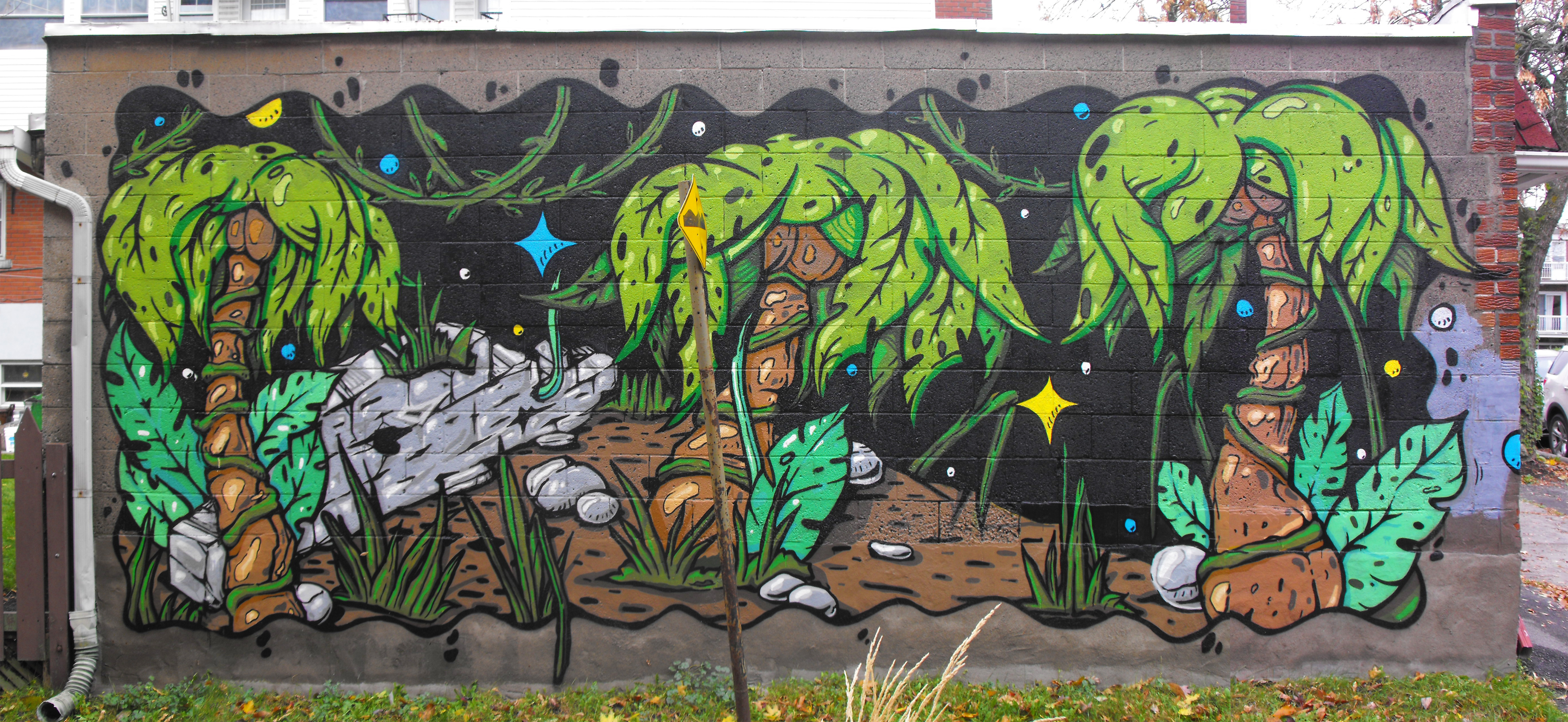 Murale située au 
4018, boulevard Rosemont (à l’angle de  l'avenue Jeanne d'arc)